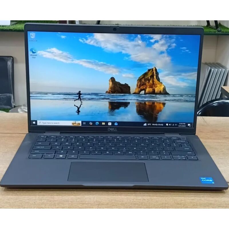 Sleek carbon fiber finish Dell Latitude 7420 laptop open on a high-end corporate office desk.
