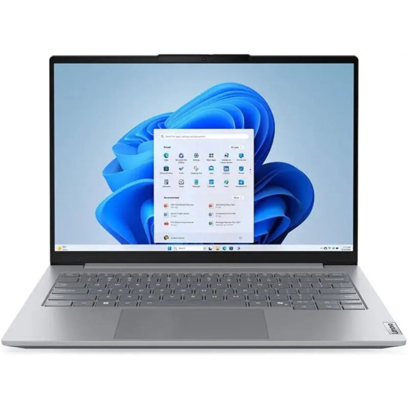 Brushed aluminum silver Dell Latitude 7400 metal laptop open on a modern office desk.