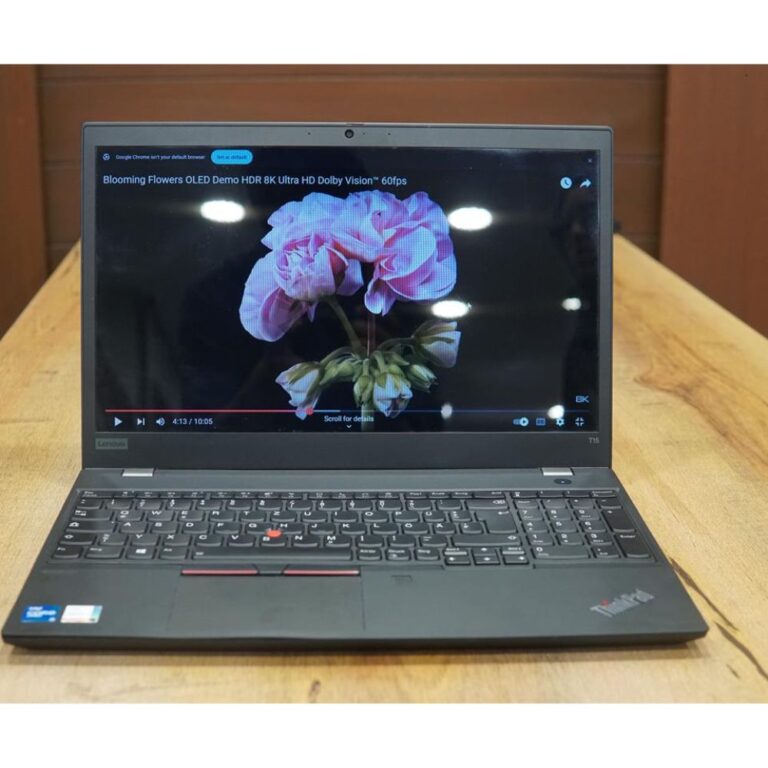 Closed matte black Lenovo ThinkPad T15 laptop showing the minimal ThinkPad logo on top.