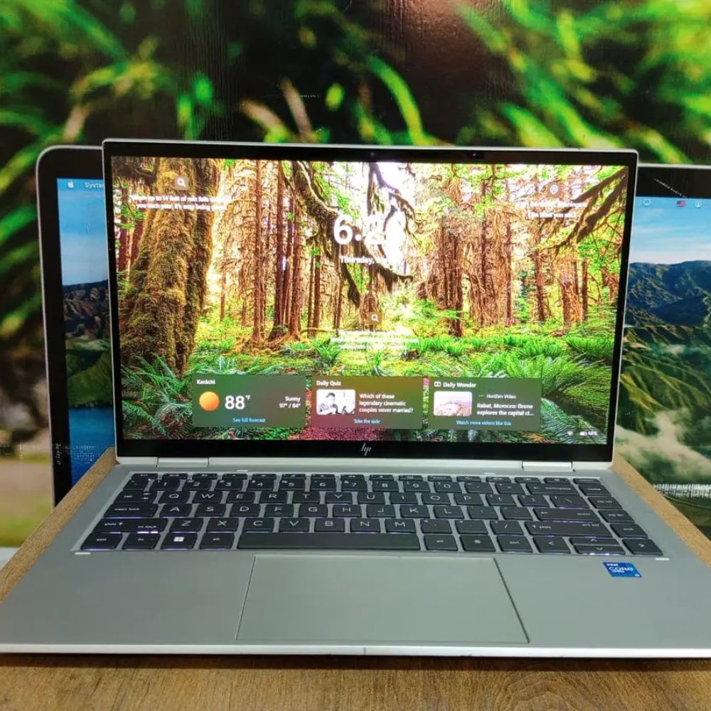 HP EliteBook Folio 1040 G8 14" Premium Touchscreen Laptop Ultra-thin silver HP EliteBook Folio 1040 G8 touchscreen laptop open on a high-end corporate desk.